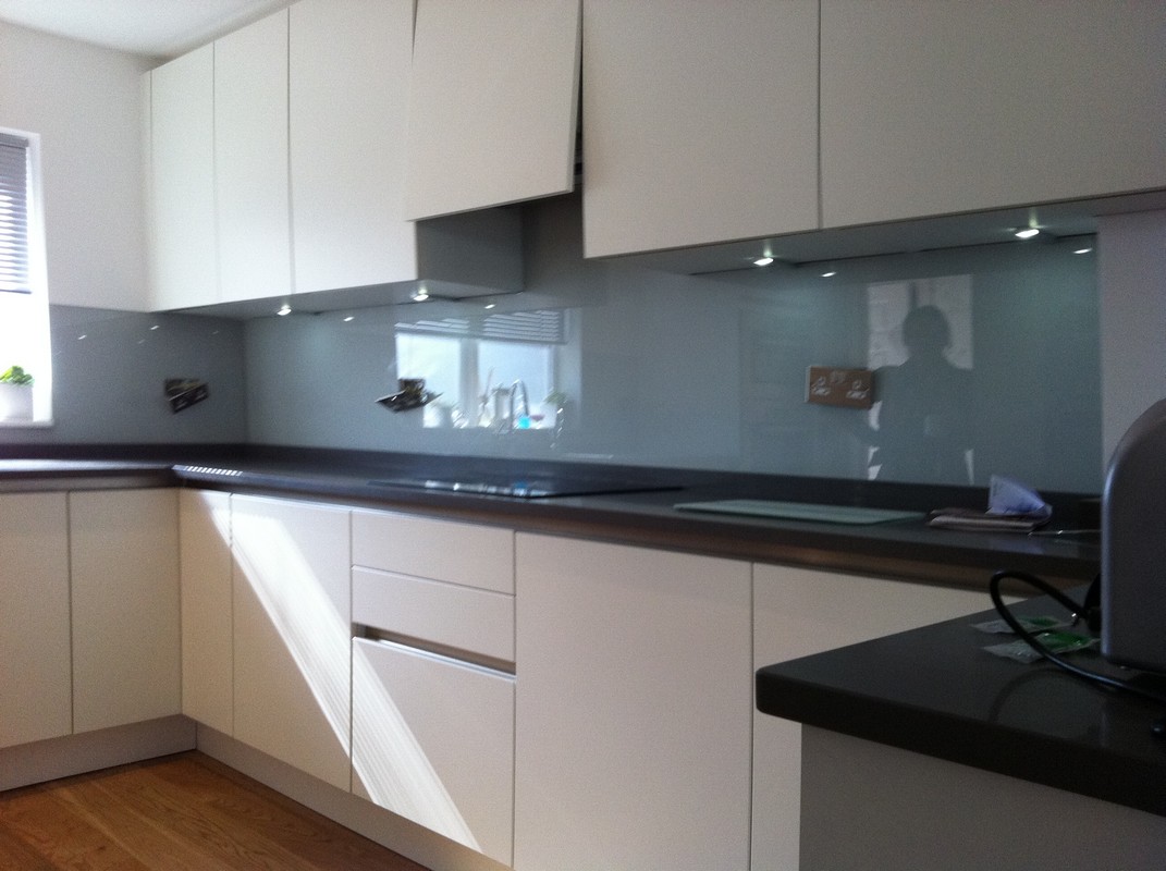Grey glass kitchen splashback with LED lighting in Hemel Hempstead