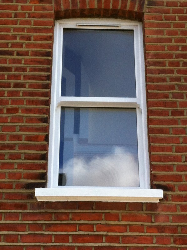 uPVC sash window on Victorian red brick house in Hemel Hempstead